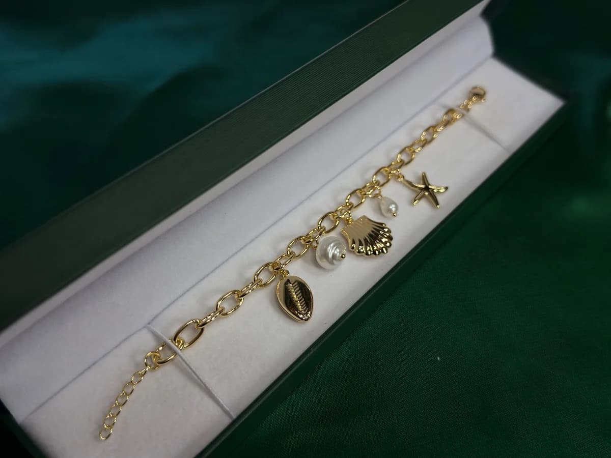 Pulsera Playita con Caracoles y Estrella en Chapa de Oro