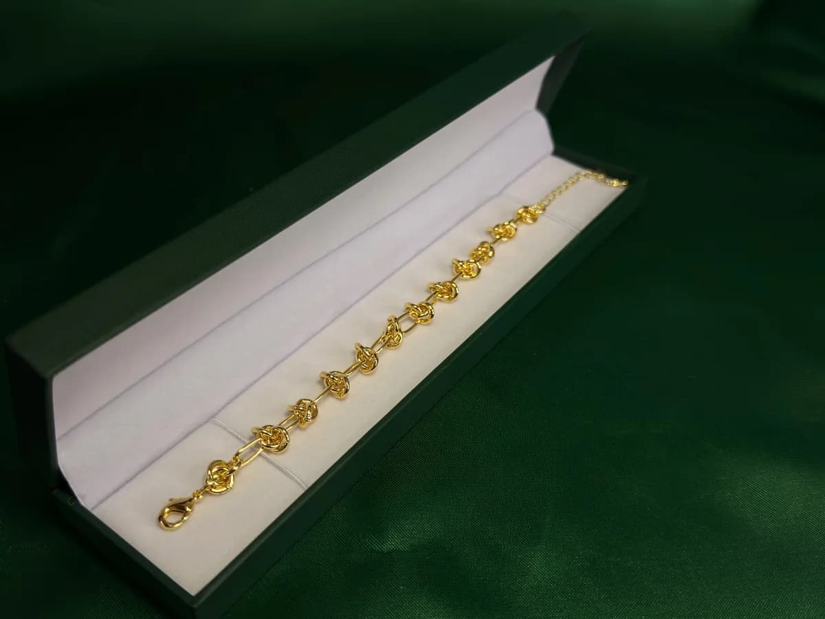 Pulsera Eslabones con Nudos de Amor en Chapa de Oro 18k