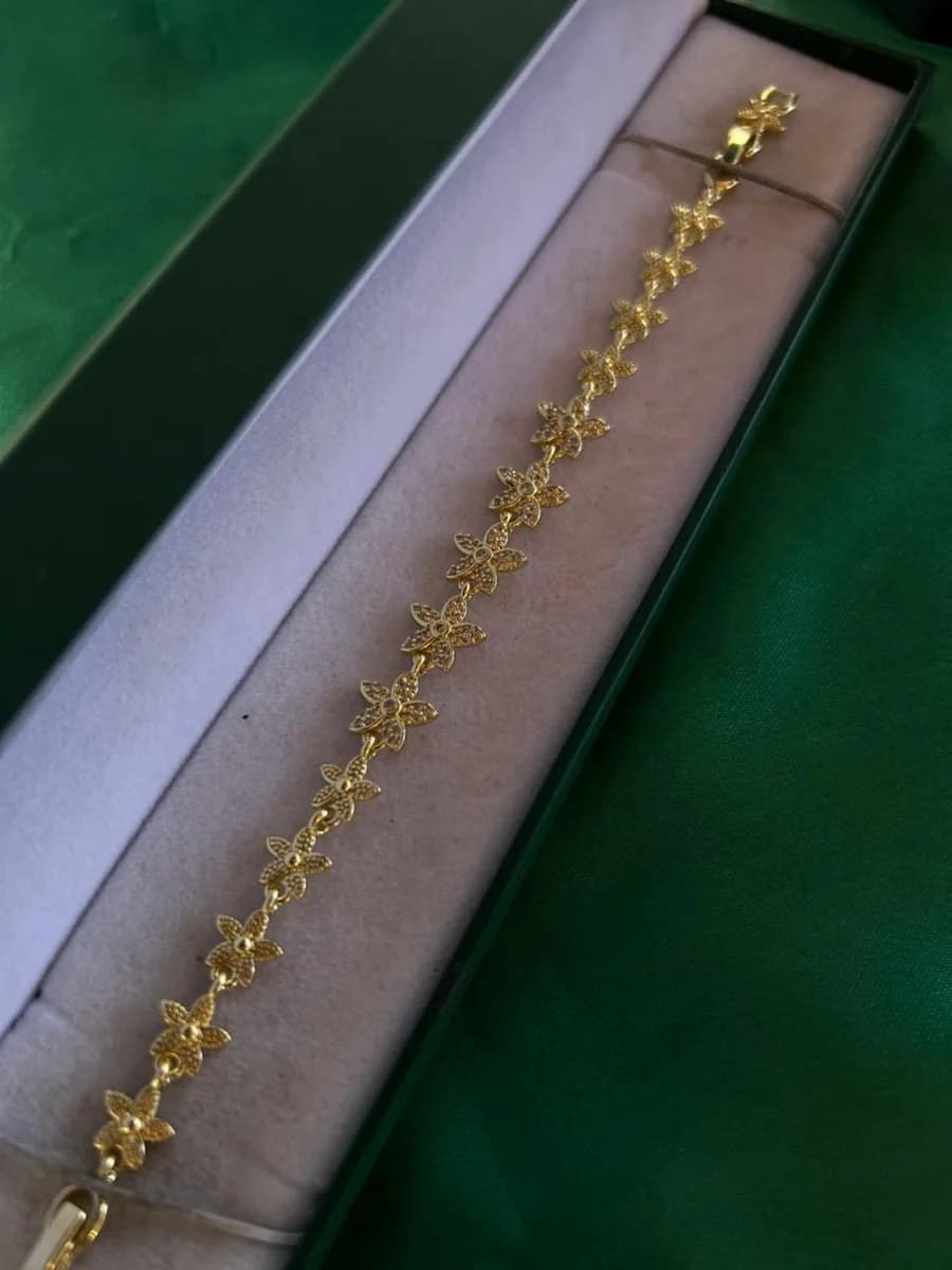 Pulsera de Flores Continuas en Chapa de Oro 18k